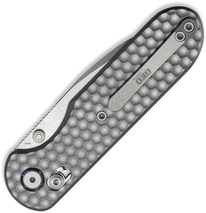 GEO KNIFE ETHEREAL CUTTER CROSSBAR LOCK GEO2402A – STONEWASH BOHLER M390 DROP POINT BLADE – HONEYCOMB TEXTURED TITANIUM HANDLE – MADE IN CHINA