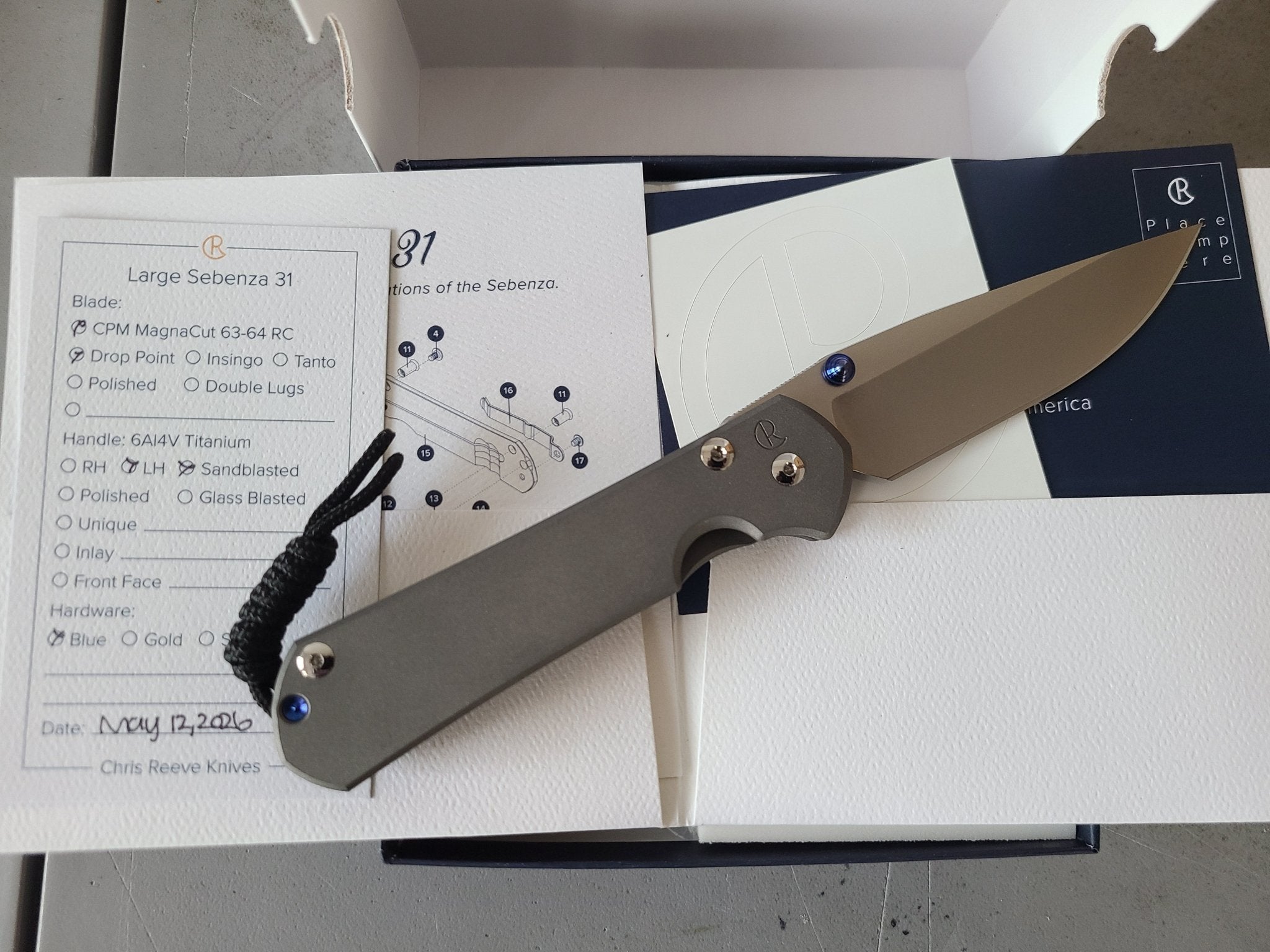 CHRIS REEVE L31 - 1001 LARGE SEBENZA DROP POINT CPM - MAGNACUT STEEL LEFT HANDED FOLDING KNIFE. - SRK KNIVES AND SPORTS INC
