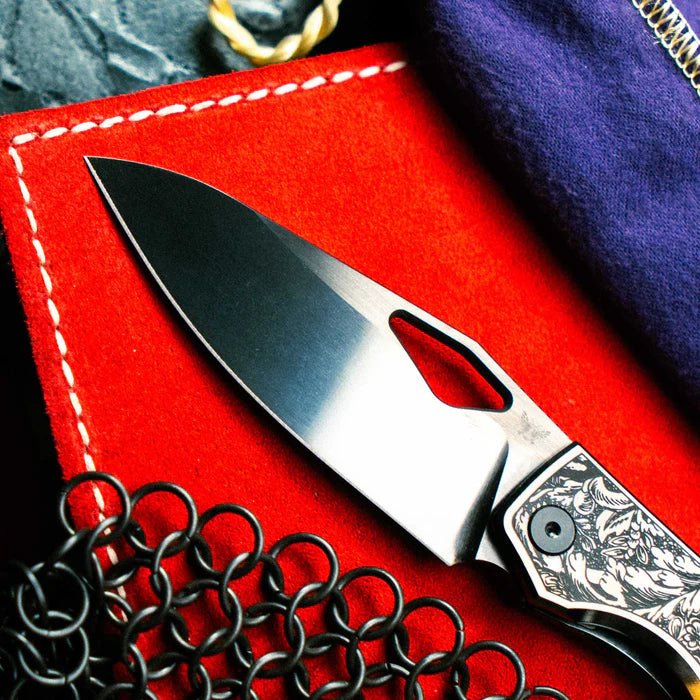FLYTANIUM KNIVES FLY-1481F THEORY OBSIDIAN FILIGREE DLC FINISH CPM-20CV STEEL LASER ETCHED FOLDING KNIFE.