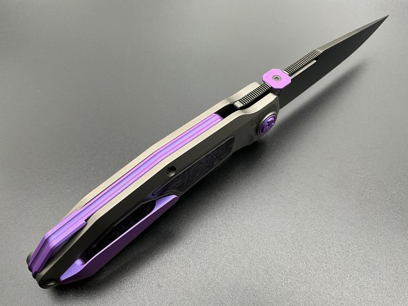 KETUO BRATVA KETM0152 – GRAY DLC BOHLER M390 CLIP POINT BLADE – GRAY TITANIUM HANDLE WITH MARBLE CARBON FIBER INLAY &amp; PURPLE ACCENTS – MADE IN CHINA - S&R Knives Inc.